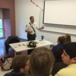 fire instructor teaching freshman students about fire safety