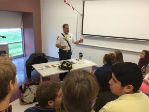 fire instructor teaching freshman students about fire safety