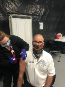 CFD firefighter receives COVID vaccine