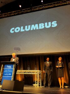 Mayor Lienhoop and Mary Ferdon accepting the Community of the Year Award, November 16, 2022