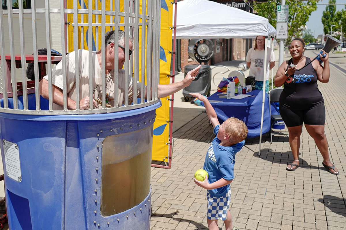 People take part in Star Spangled Kids Day during Columbus's Celebrate 250 on Fourth Street in downtown Columbus, Indiana, Wednesday, July 1,, 2026. Celebrate 250 is a six celebration marking America's 250th anniversary.