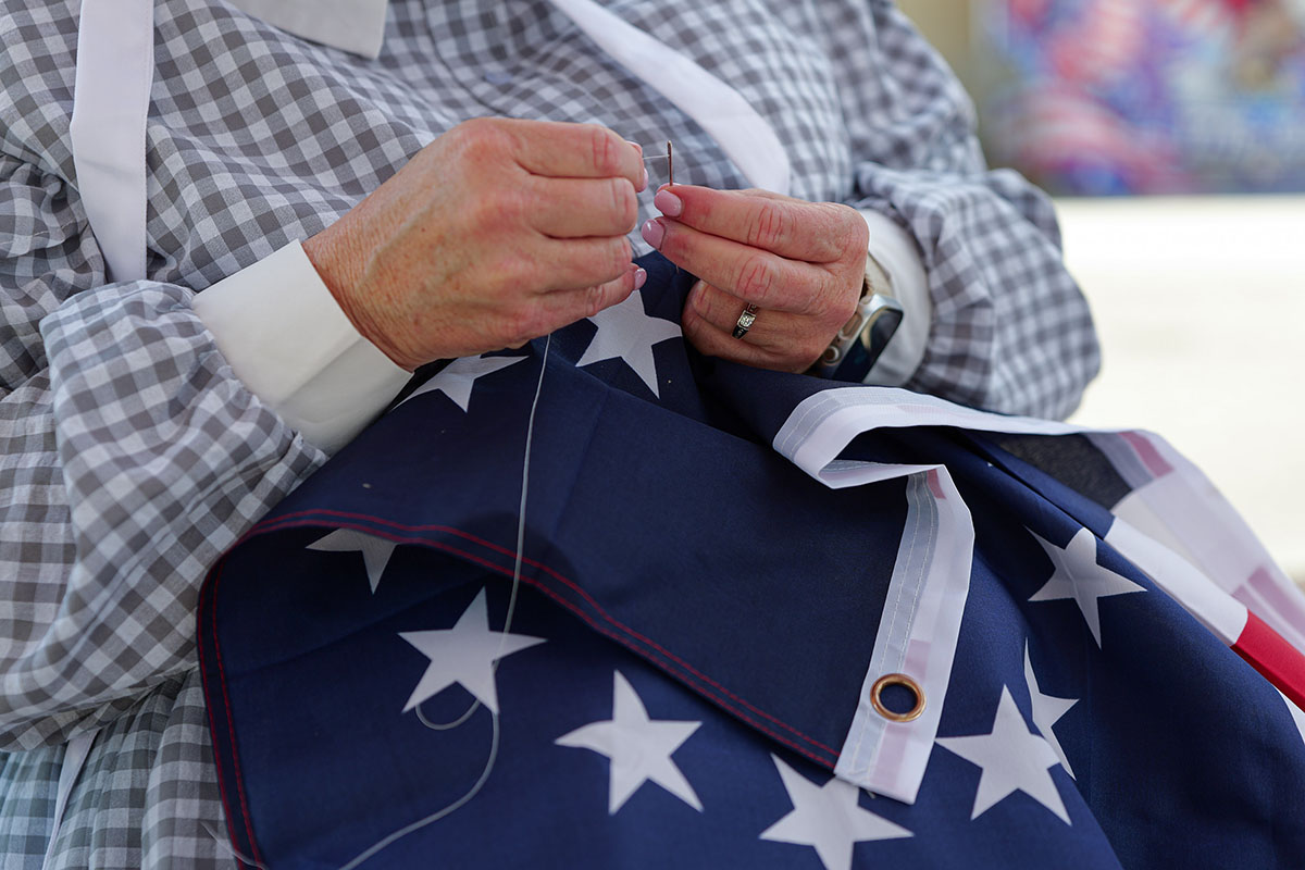People take part in American Revolutino Day during Columbus's Celebrate 250's on Fourth Street in downtown Columbus, Indiana, Monday, June 29, 2026. Celebrate 250 is a six celebration marking America's 250th anniversary.
