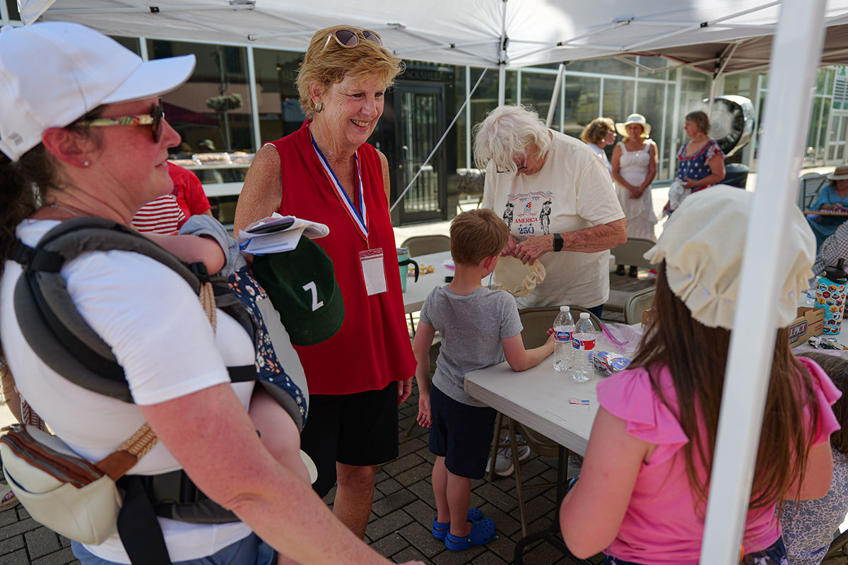 People take part in American Revolutino Day during Columbus's Celebrate 250's on Fourth Street in downtown Columbus, Indiana, Monday, June 29, 2026. Celebrate 250 is a six celebration marking America's 250th anniversary.