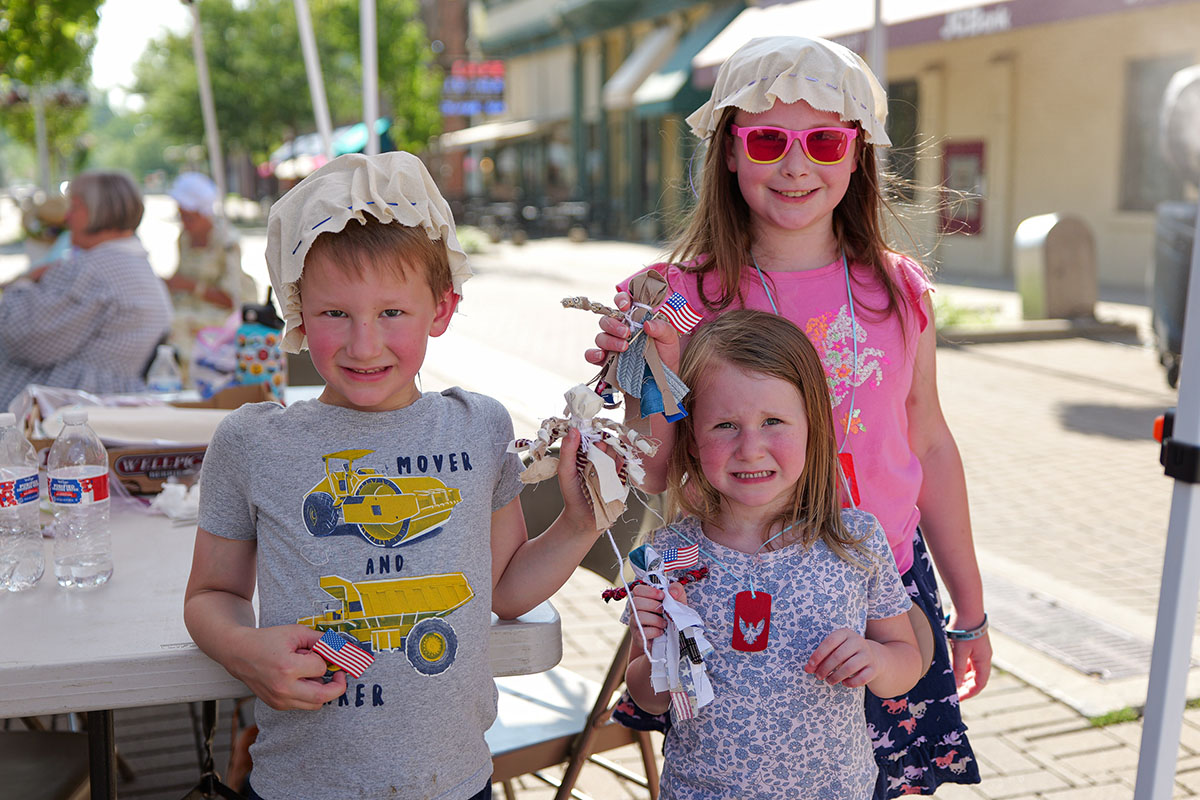 People take part in American Revolutino Day during Columbus's Celebrate 250's on Fourth Street in downtown Columbus, Indiana, Monday, June 29, 2026. Celebrate 250 is a six celebration marking America's 250th anniversary.