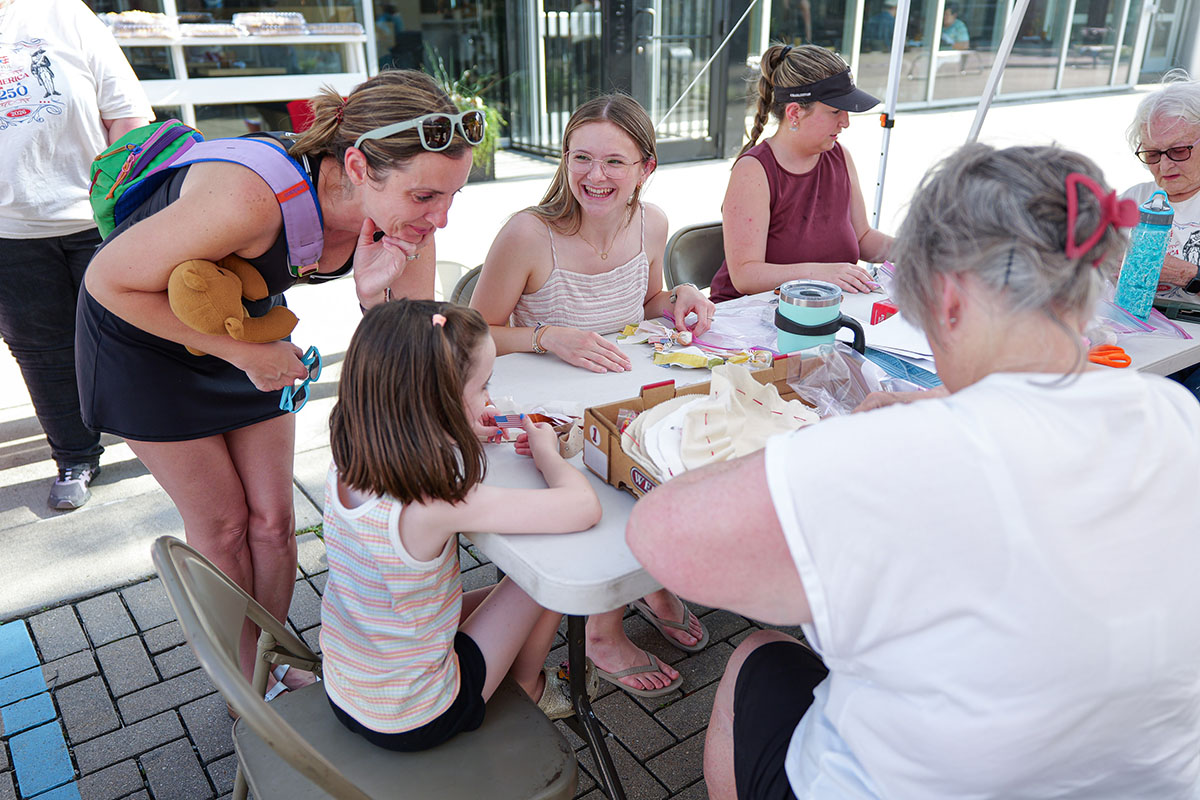People take part in American Revolutino Day during Columbus's Celebrate 250's on Fourth Street in downtown Columbus, Indiana, Monday, June 29, 2026. Celebrate 250 is a six celebration marking America's 250th anniversary.