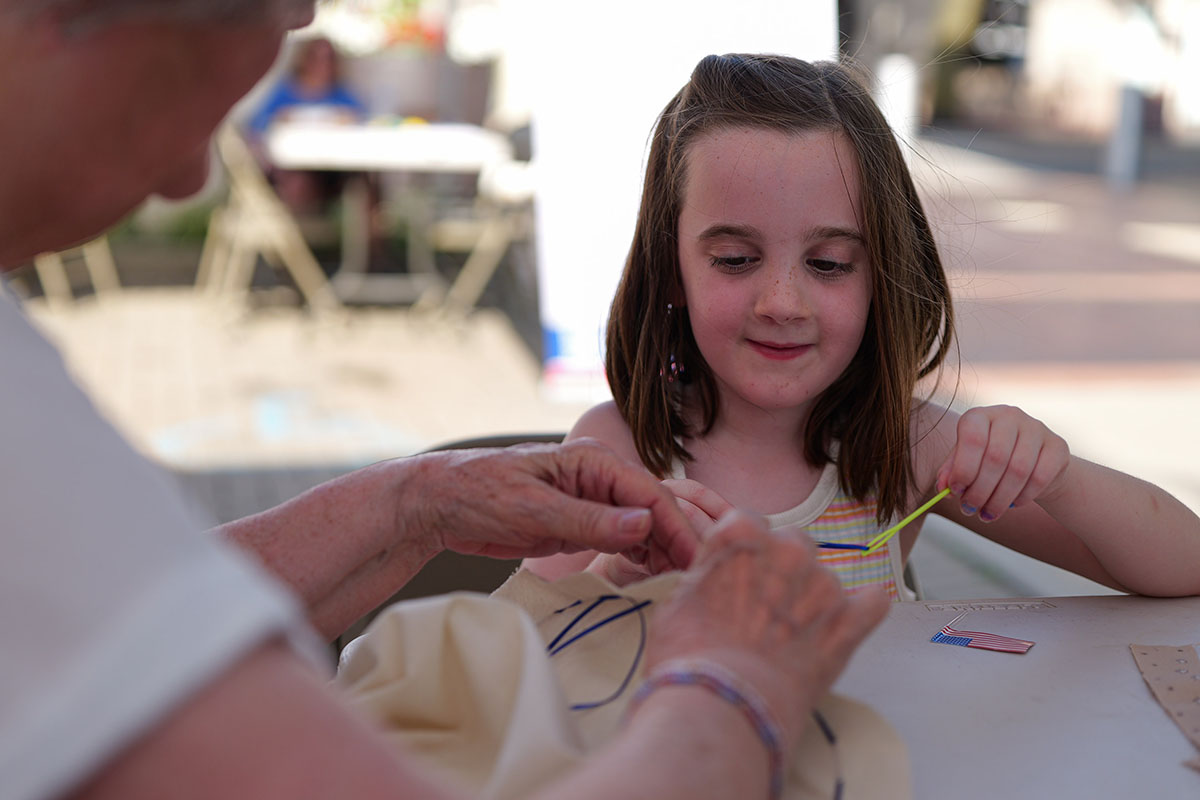 People take part in American Revolutino Day during Columbus's Celebrate 250's on Fourth Street in downtown Columbus, Indiana, Monday, June 29, 2026. Celebrate 250 is a six celebration marking America's 250th anniversary.