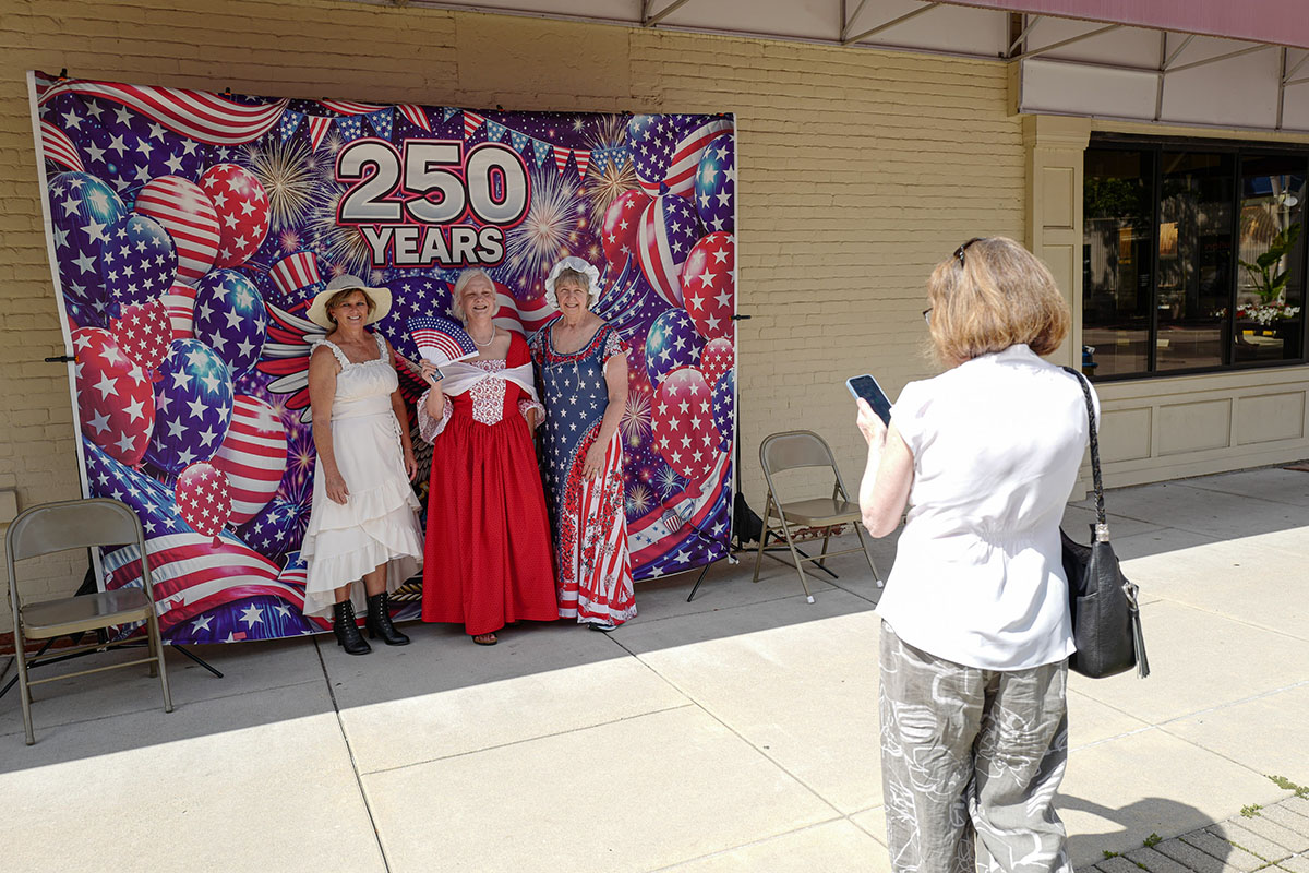 People take part in American Revolutino Day during Columbus's Celebrate 250's on Fourth Street in downtown Columbus, Indiana, Monday, June 29, 2026. Celebrate 250 is a six celebration marking America's 250th anniversary.
