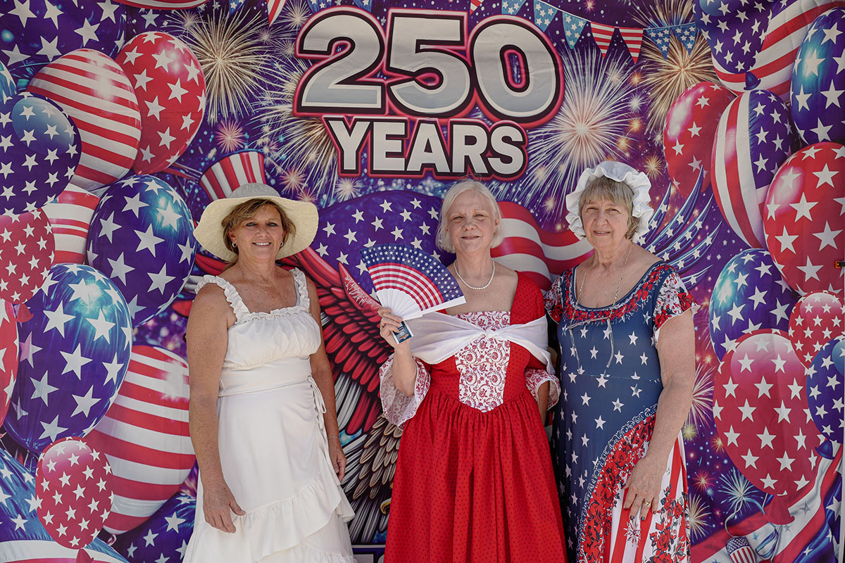 People take part in American Revolutino Day during Columbus's Celebrate 250's on Fourth Street in downtown Columbus, Indiana, Monday, June 29, 2026. Celebrate 250 is a six celebration marking America's 250th anniversary.