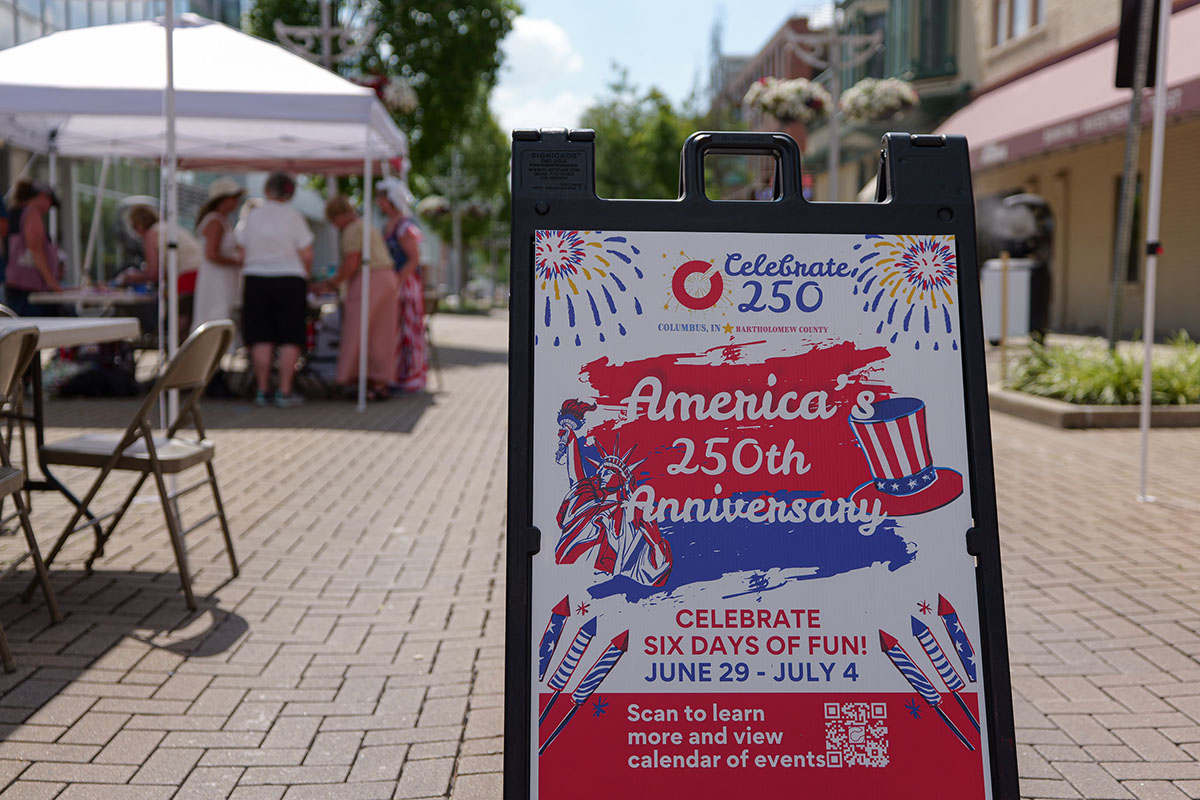 People take part in American Revolutino Day during Columbus's Celebrate 250's on Fourth Street in downtown Columbus, Indiana, Monday, June 29, 2026. Celebrate 250 is a six celebration marking America's 250th anniversary.