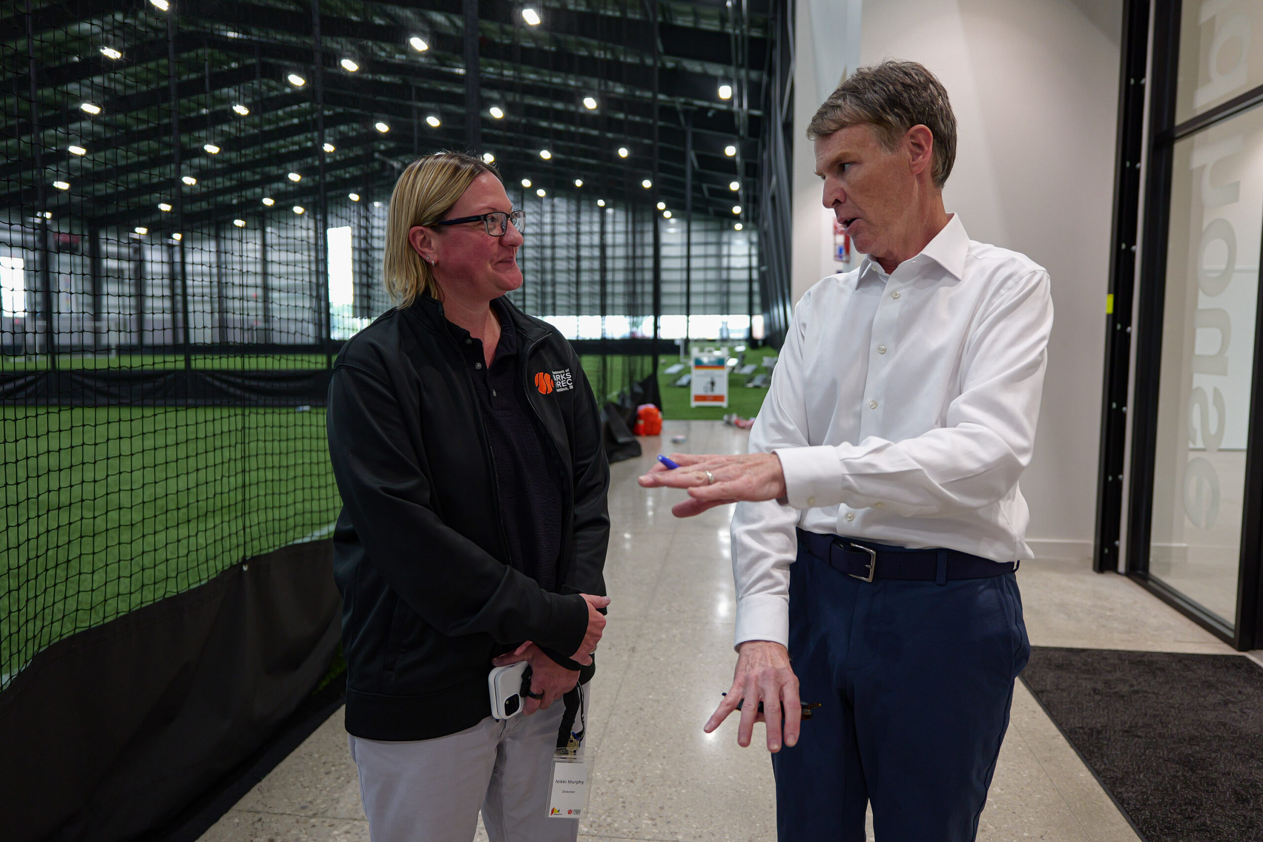Columbus Parks and Recreation Director Nikki Murphy visits with U.S. Rep. Jefferson Shreve, R-Ind., during his visit to NexusPark in Columbus, Ind., Thursday, July 9, 2026.