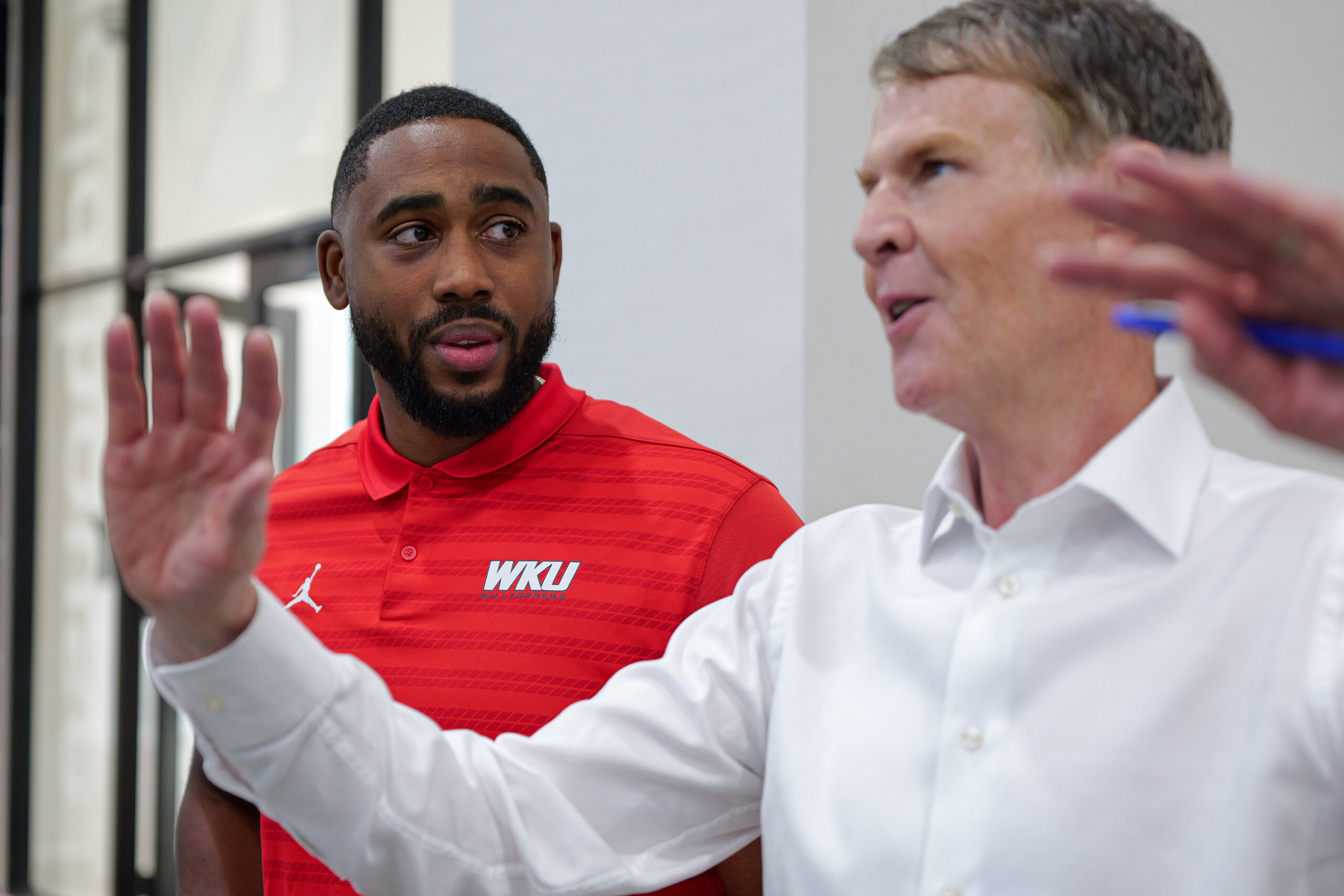 Circle K Fieldhouse Manager Martavius Mims, left, talks with U.S. Rep. Jefferson Shreve, R-Ind., during Shreve's visit to NexusPark in Columbus, Ind., Thursday, July 9, 2026.