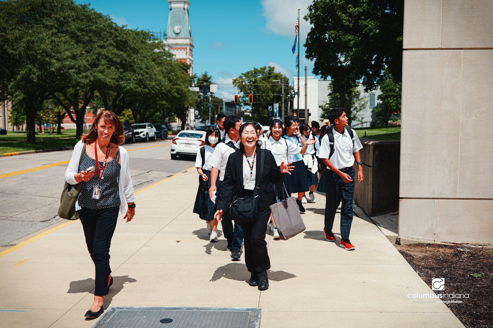 A delegation of students and school officials from Miyoshi-Minami Junior High School arrives at Columbus City Hall for a tour of the building in Columbus, Ind., Thursday, Aug. 20, 2026. Miyoshi is Columbus’ sister city in Japan.