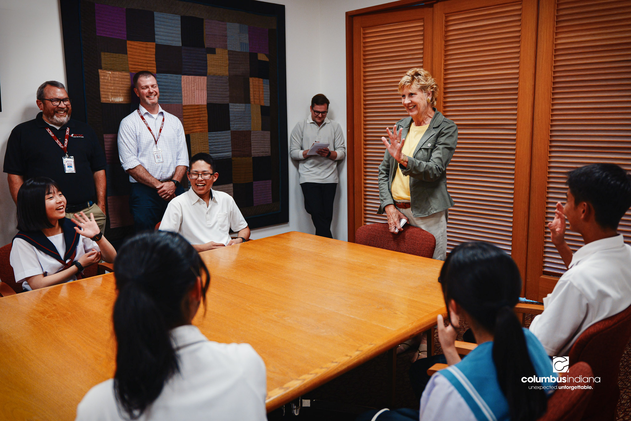 Columbus Mayor Mary Ferdon greets a delegation of students and school officials from Miyoshi-Minami Junior High School in a conference room at Columbus City Hall in Columbus, Ind., Thursday, Aug. 20, 2026. The delegation of students and school offici