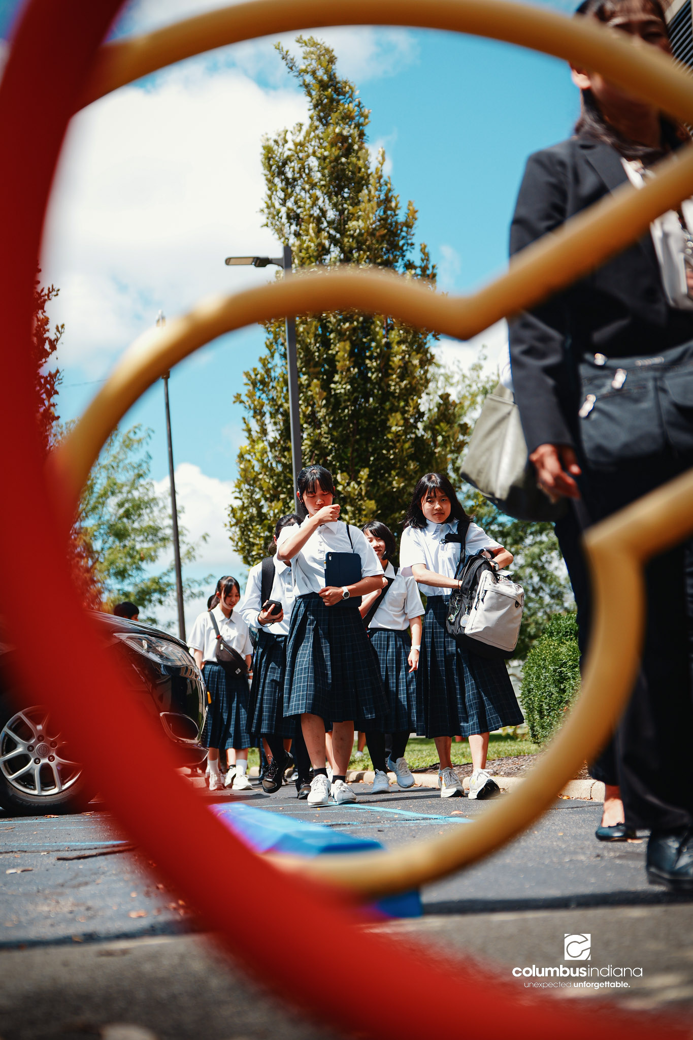 A delegation of students and school officials from Miyoshi-Minami Junior High School arrives at Columbus City Hall for a tour of the building in Columbus, Ind., Thursday, Aug. 20, 2026. Miyoshi is Columbus’ sister city in Japan. Student visits to C