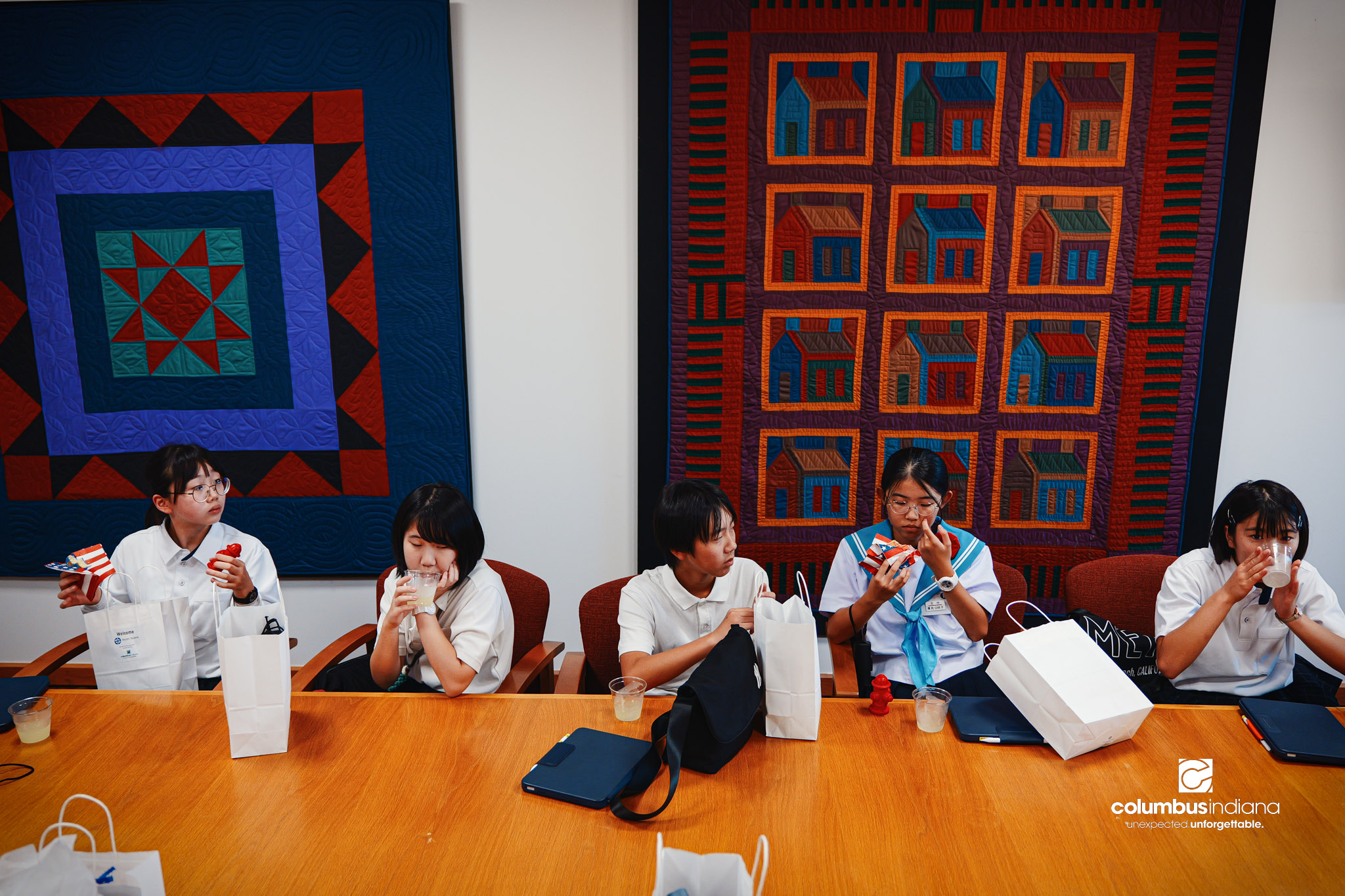 Miyoshi-Minami Junior High students eat cookies and drink lemonade after a tour of Columbus City Hall in Columbus, Ind., Thursday, Aug. 20, 2026. Miyoshi is Columbus’ sister city in Japan. Student visits to Columbus are an annual tradition that beg