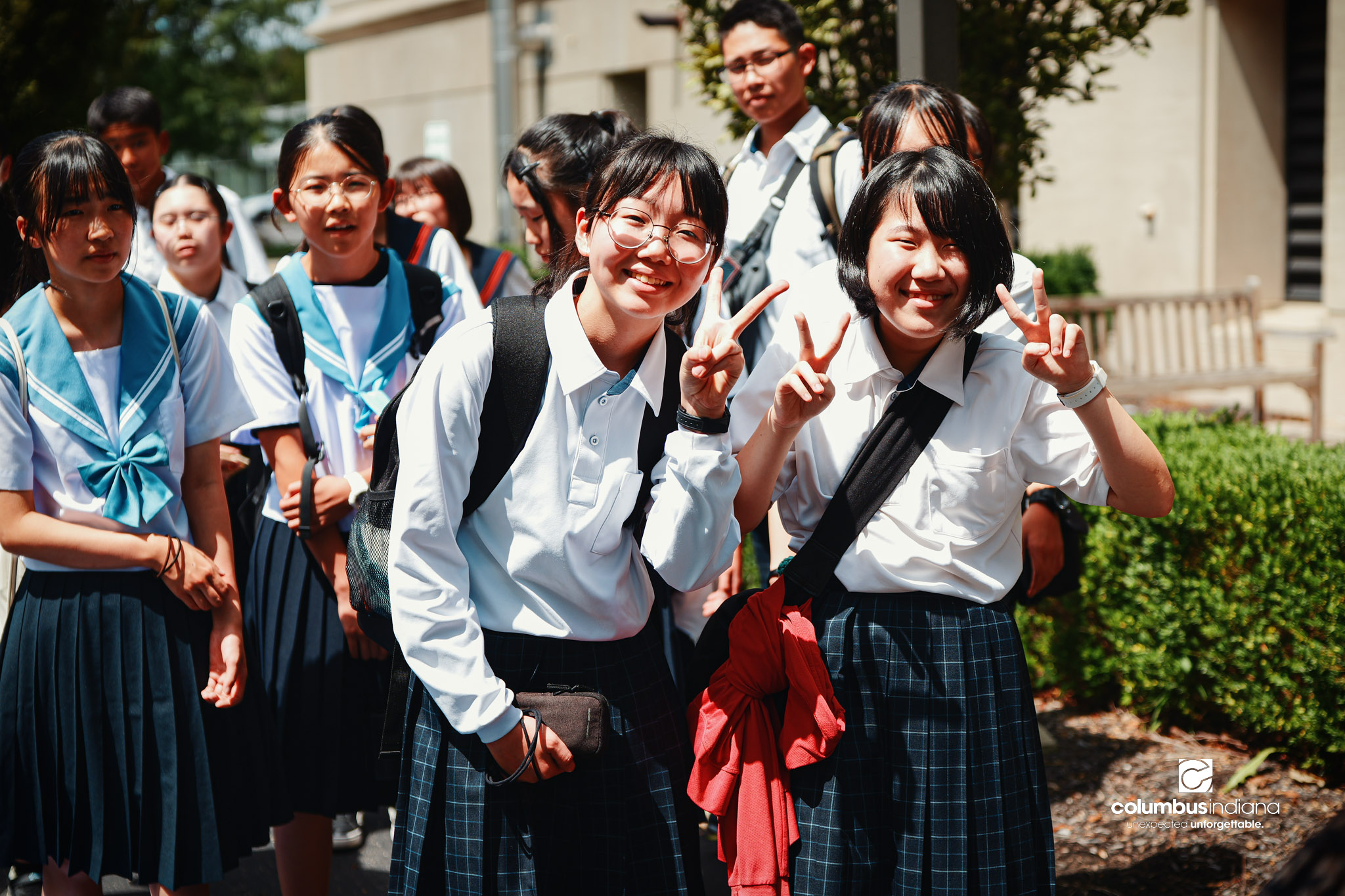 Miyoshi-Minami Junior High students pose for a photo outside Columbus City Hall in Columbus, Ind., Thursday, Aug. 20, 2026. A delegation of students and school officials from Miyoshi visited City Hall for a tour of the building as part of their visit