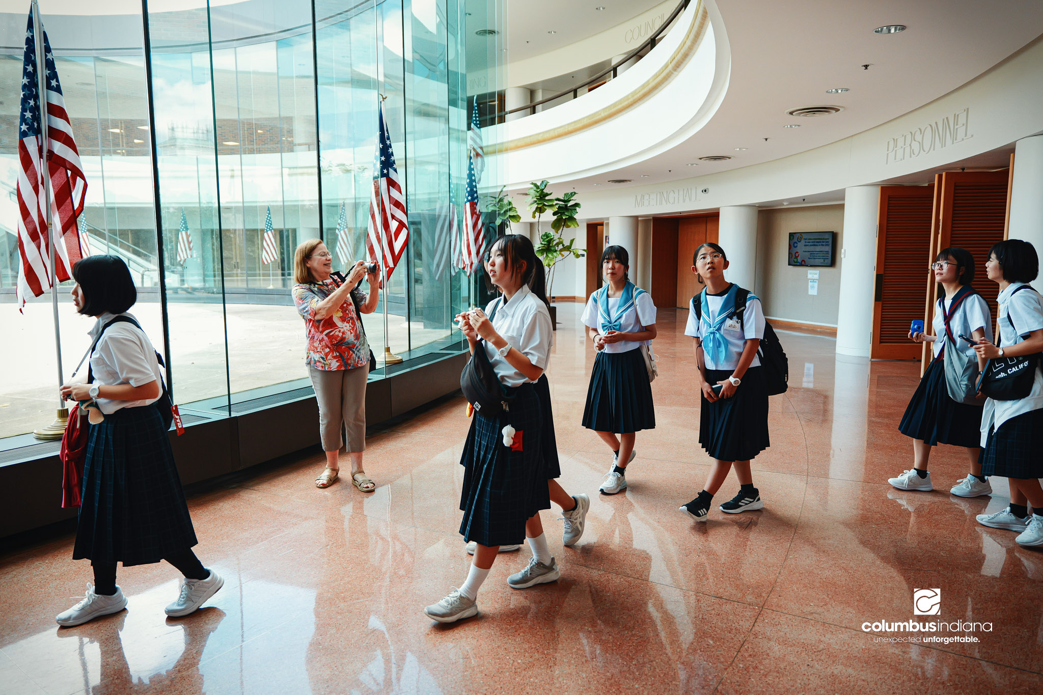 A delegation of students and school officials from Miyoshi-Minami Junior High School arrives at Columbus City Hall for a tour of the building in Columbus, Ind., Thursday, Aug. 20, 2026. Miyoshi is Columbus’ sister city in Japan. Student visits to C