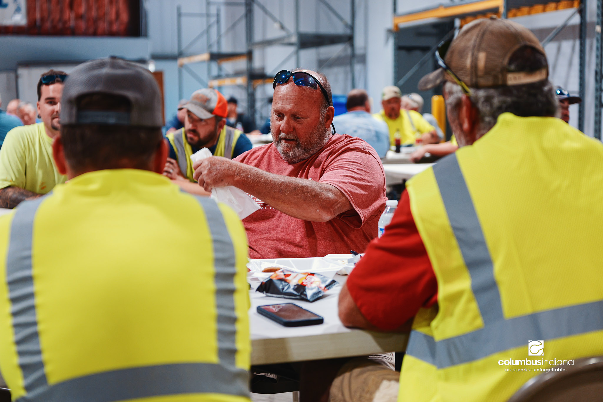 These images show an employee appreciation lunch and award ceremony for years of service to the Columbus, Indiana Department of Public Works.