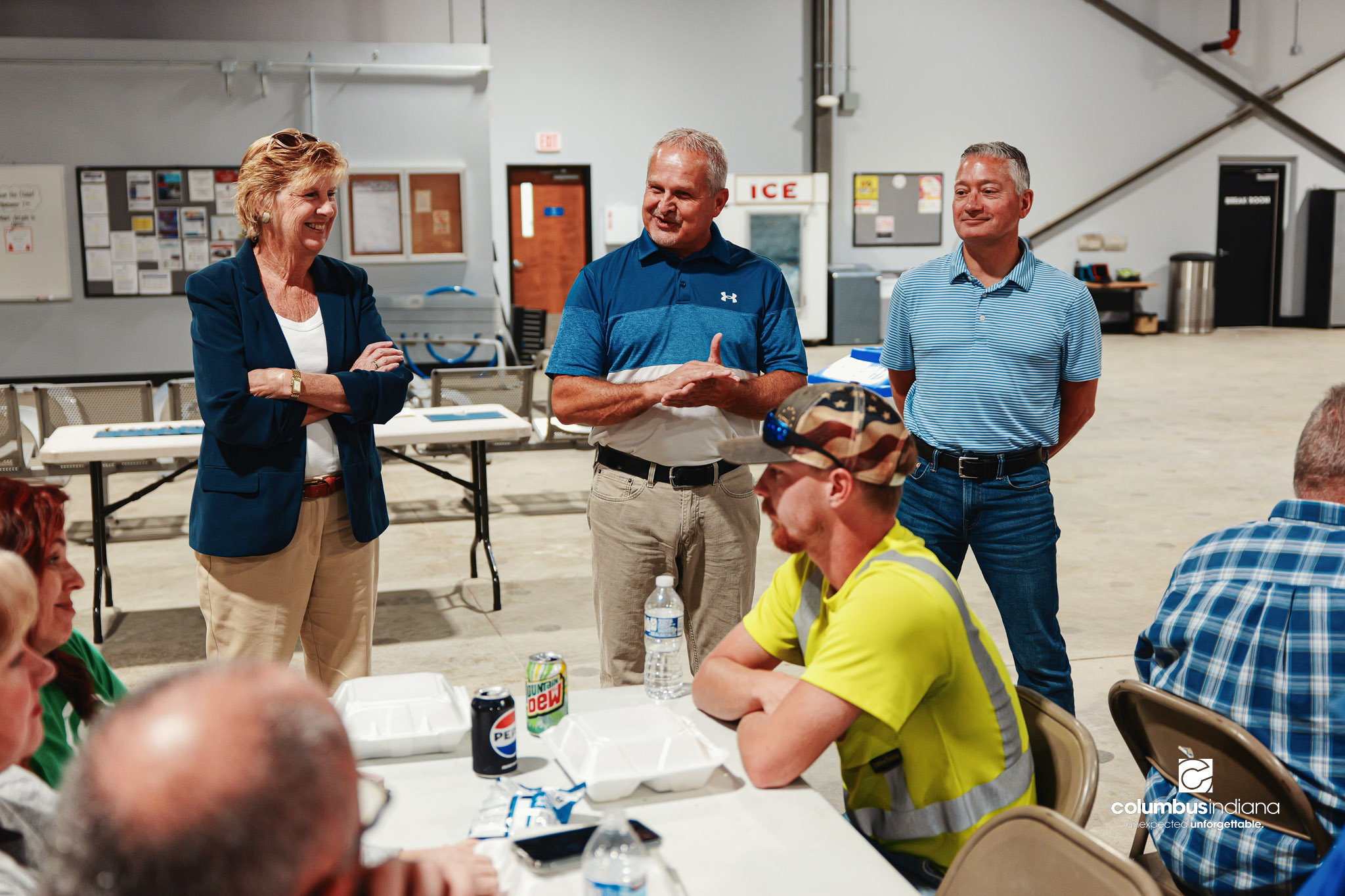 These images show an employee appreciation lunch and award ceremony for years of service to the Columbus, Indiana Department of Public Works.