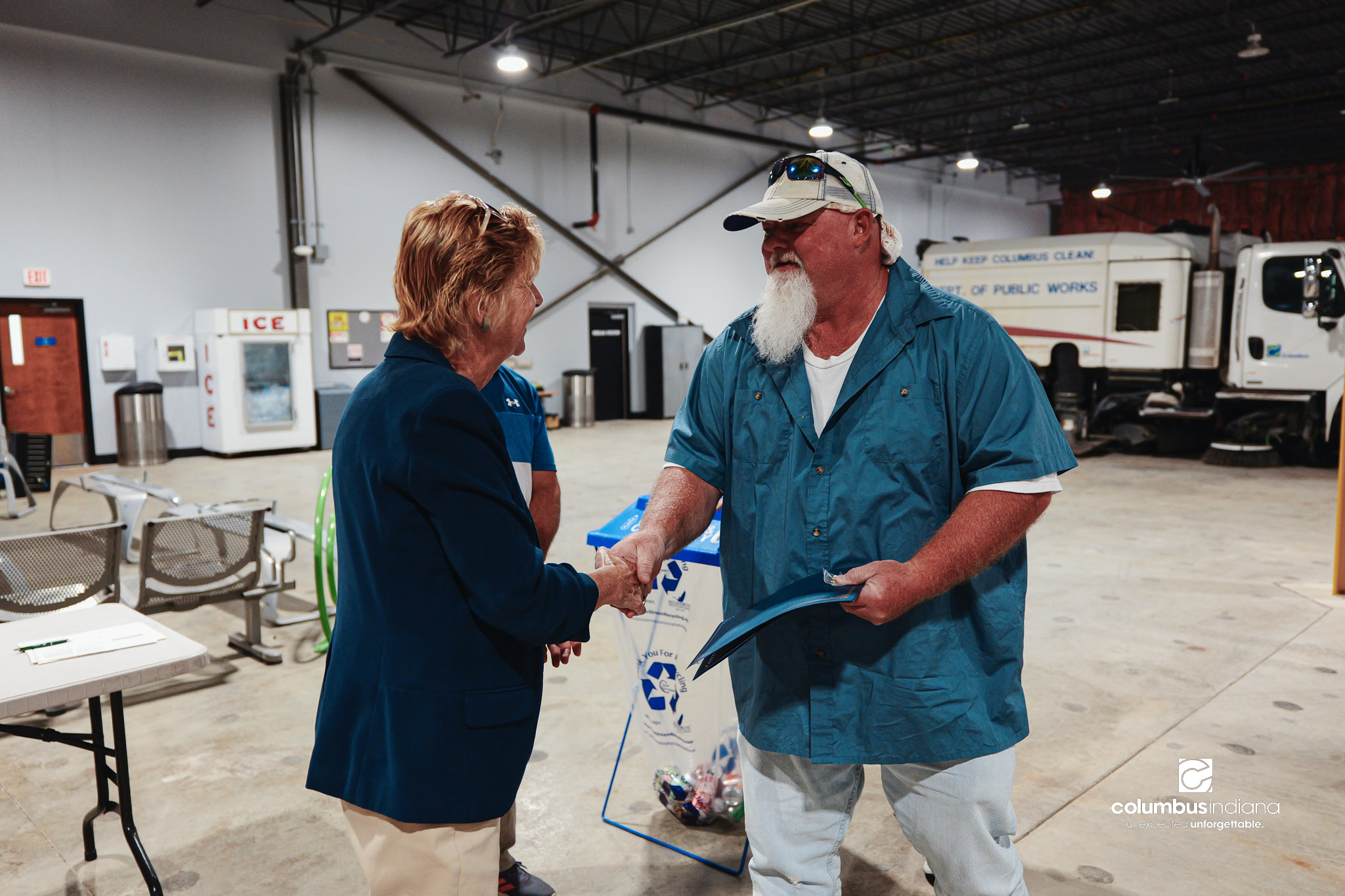 These images show an employee appreciation lunch and award ceremony for years of service to the Columbus, Indiana Department of Public Works.