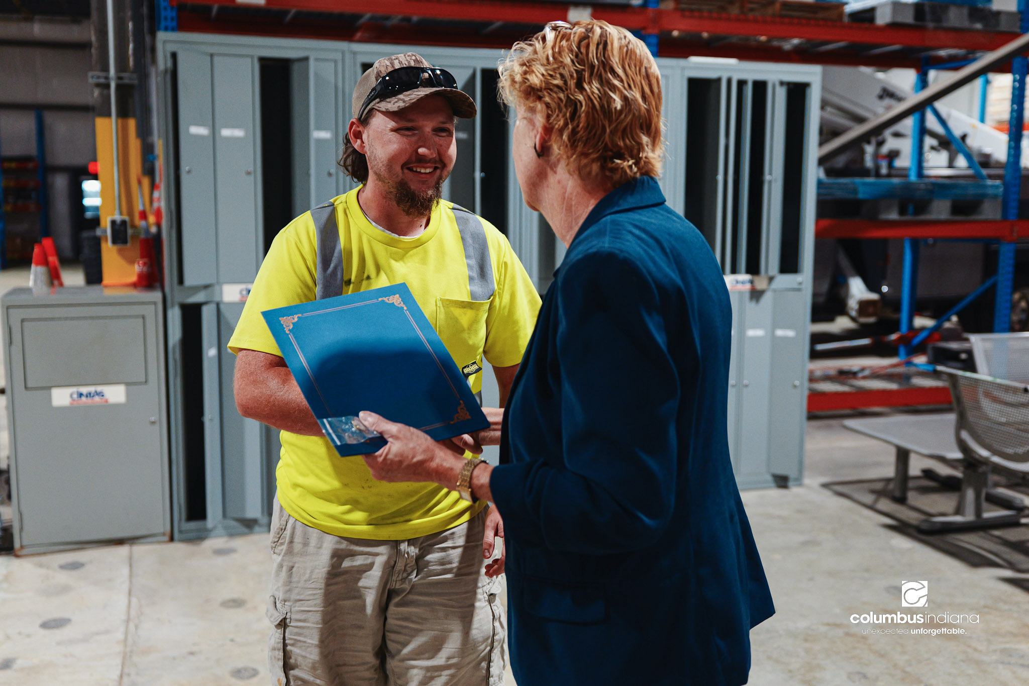 These images show an employee appreciation lunch and award ceremony for years of service to the Columbus, Indiana Department of Public Works.