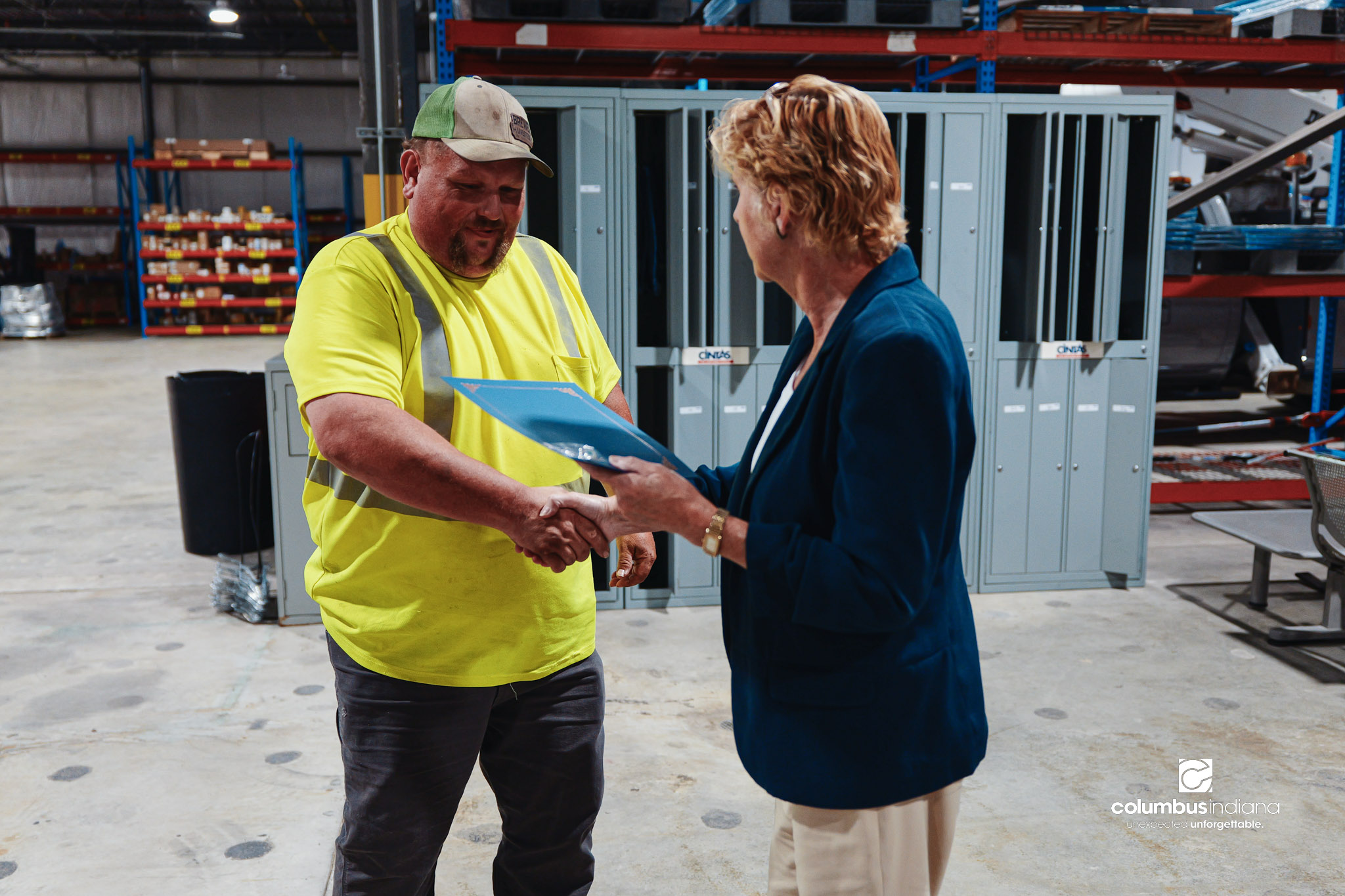 These images show an employee appreciation lunch and award ceremony for years of service to the Columbus, Indiana Department of Public Works.