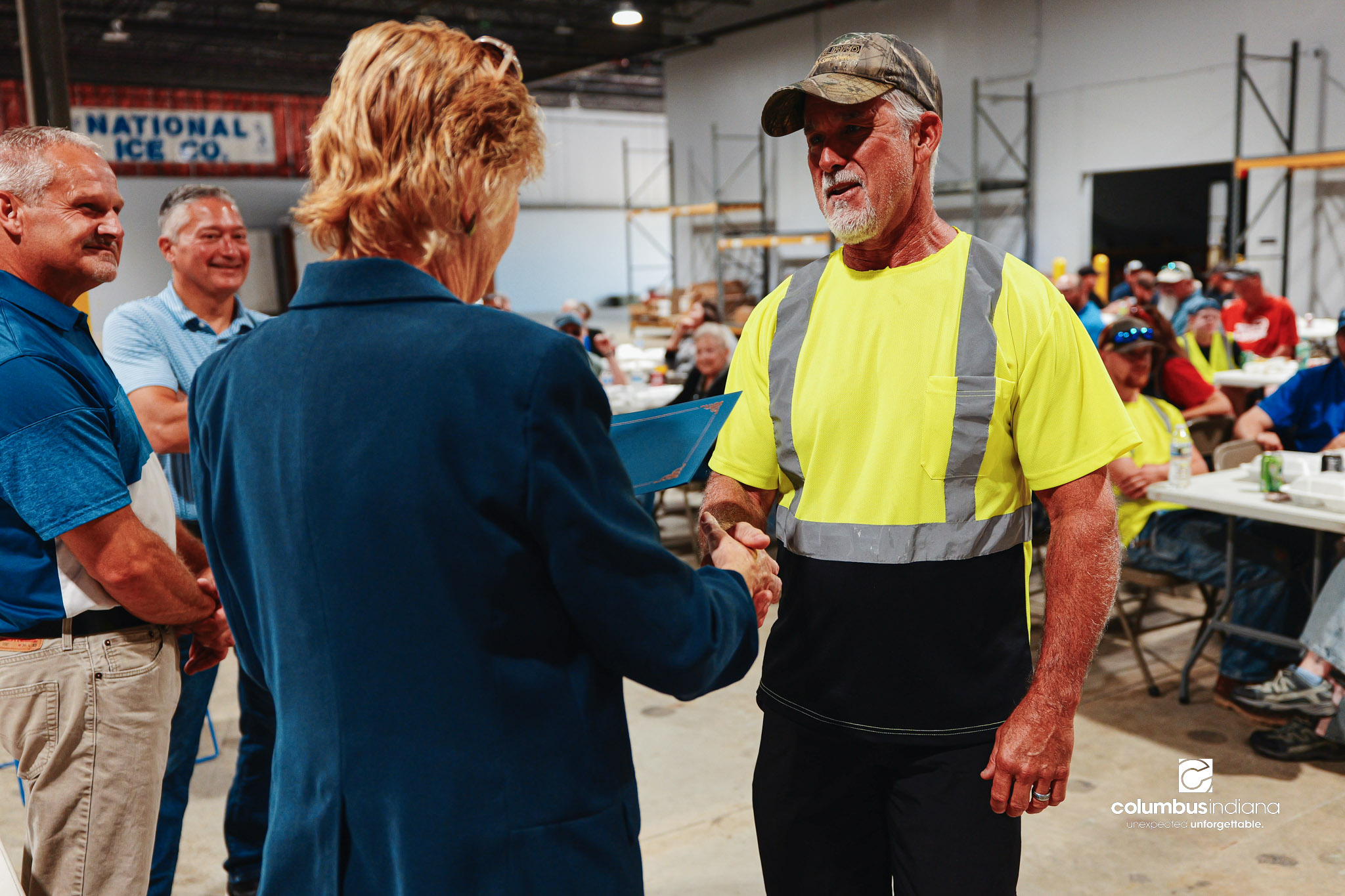 These images show an employee appreciation lunch and award ceremony for years of service to the Columbus, Indiana Department of Public Works.