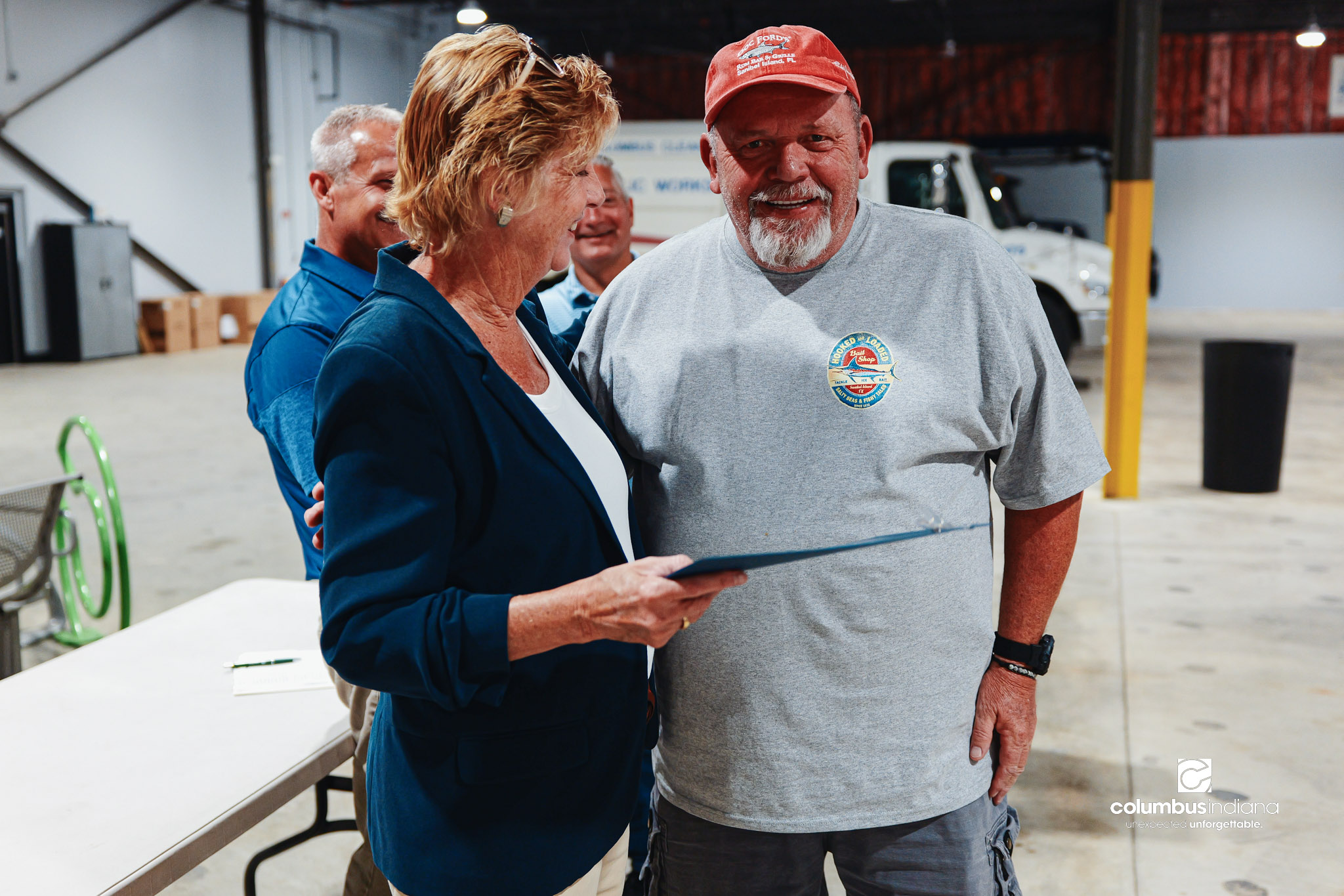 These images show an employee appreciation lunch and award ceremony for years of service to the Columbus, Indiana Department of Public Works.
