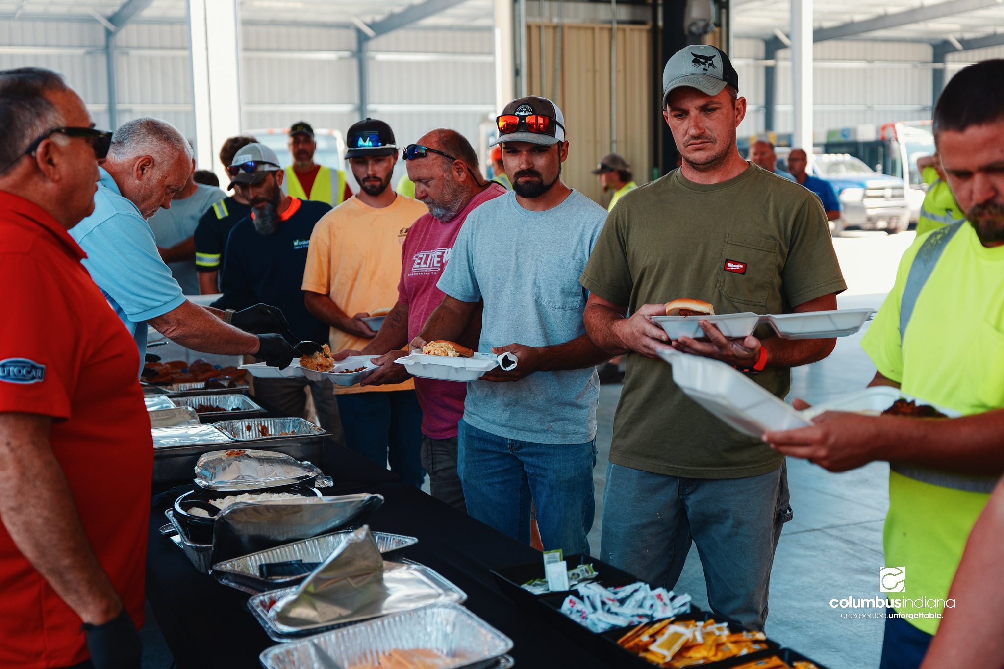 These images show an employee appreciation lunch and award ceremony for years of service to the Columbus, Indiana Department of Public Works.