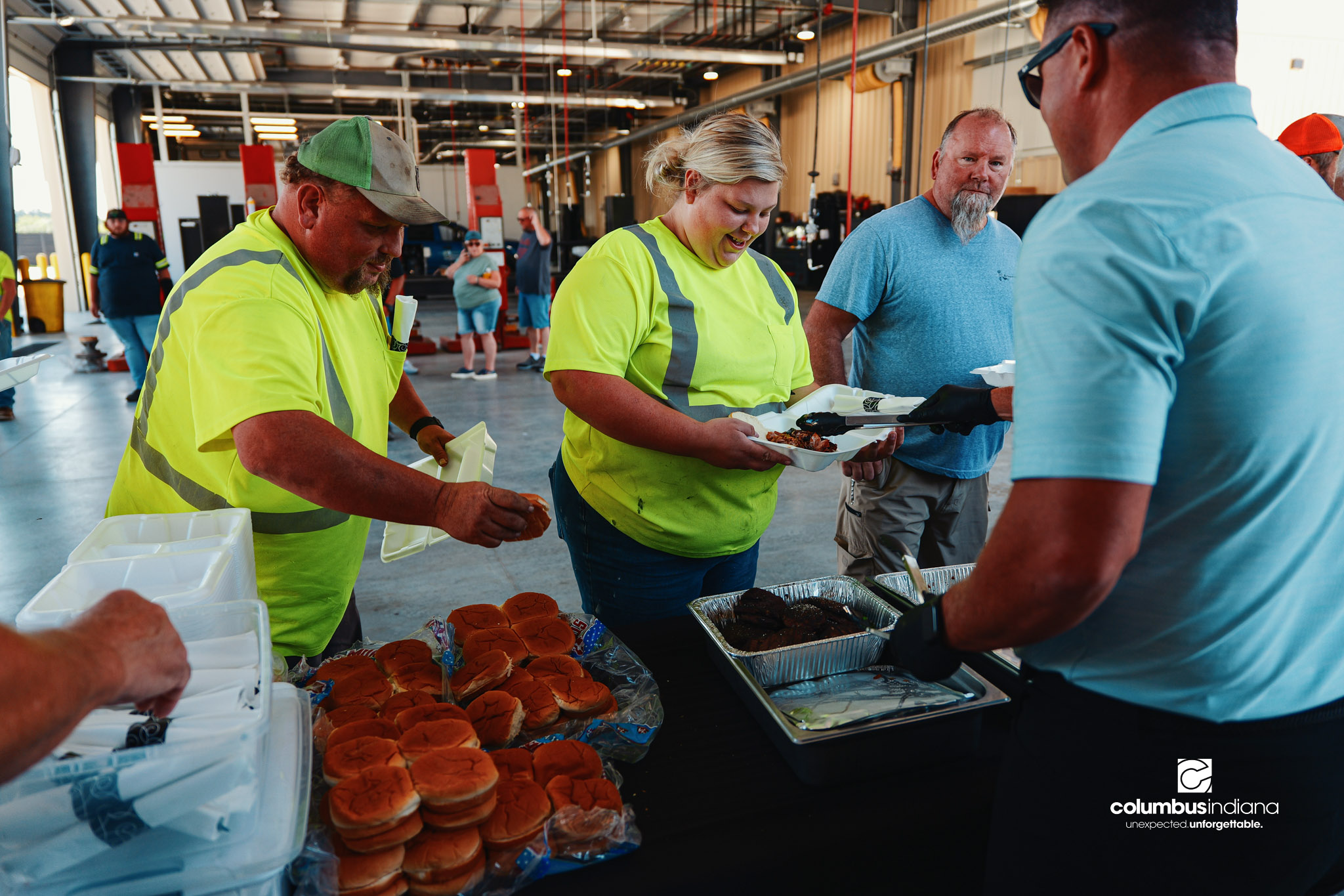 These images show an employee appreciation lunch and award ceremony for years of service to the Columbus, Indiana Department of Public Works.
