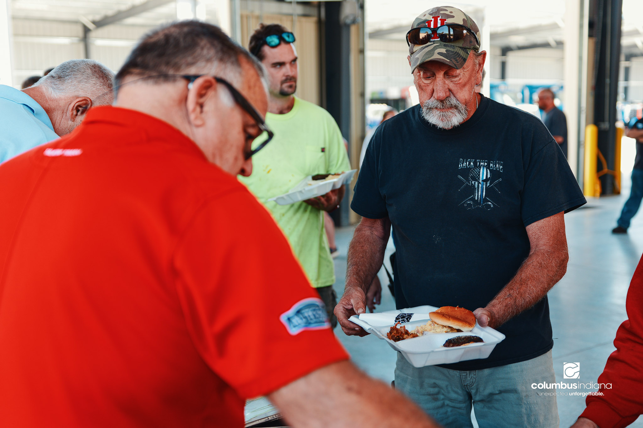These images show an employee appreciation lunch and award ceremony for years of service to the Columbus, Indiana Department of Public Works.