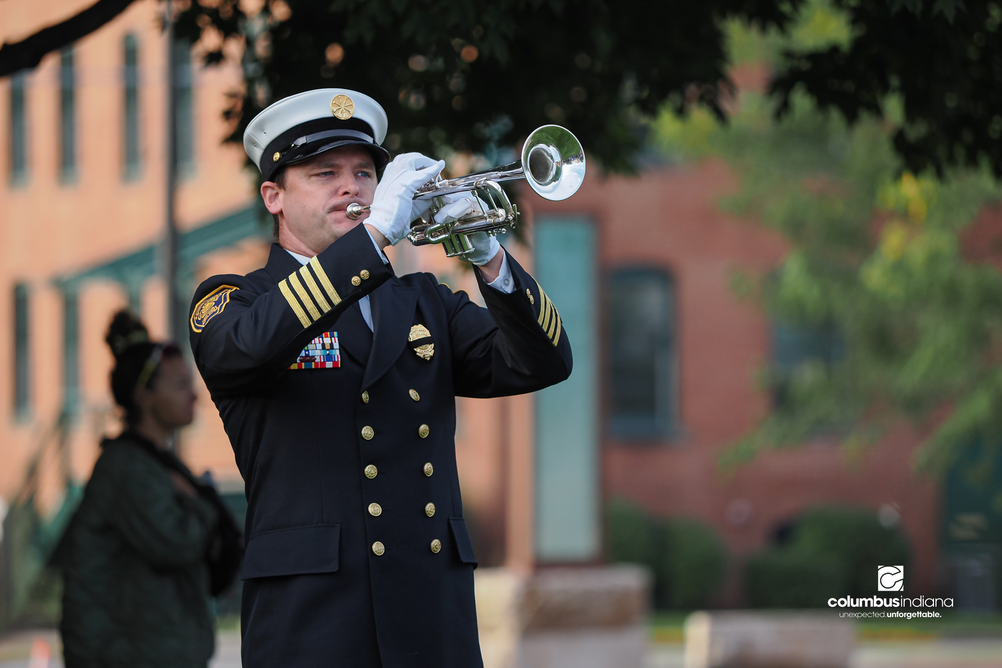 Columbus Township Fire Department Deputy Chief of Administration Dan Merz plays Taps during a ceremony to commemorate the 25th anniversary of Sept. 11, at Columbus City Hall in Columbus, Ind., Friday, Sept. 11, 2026.