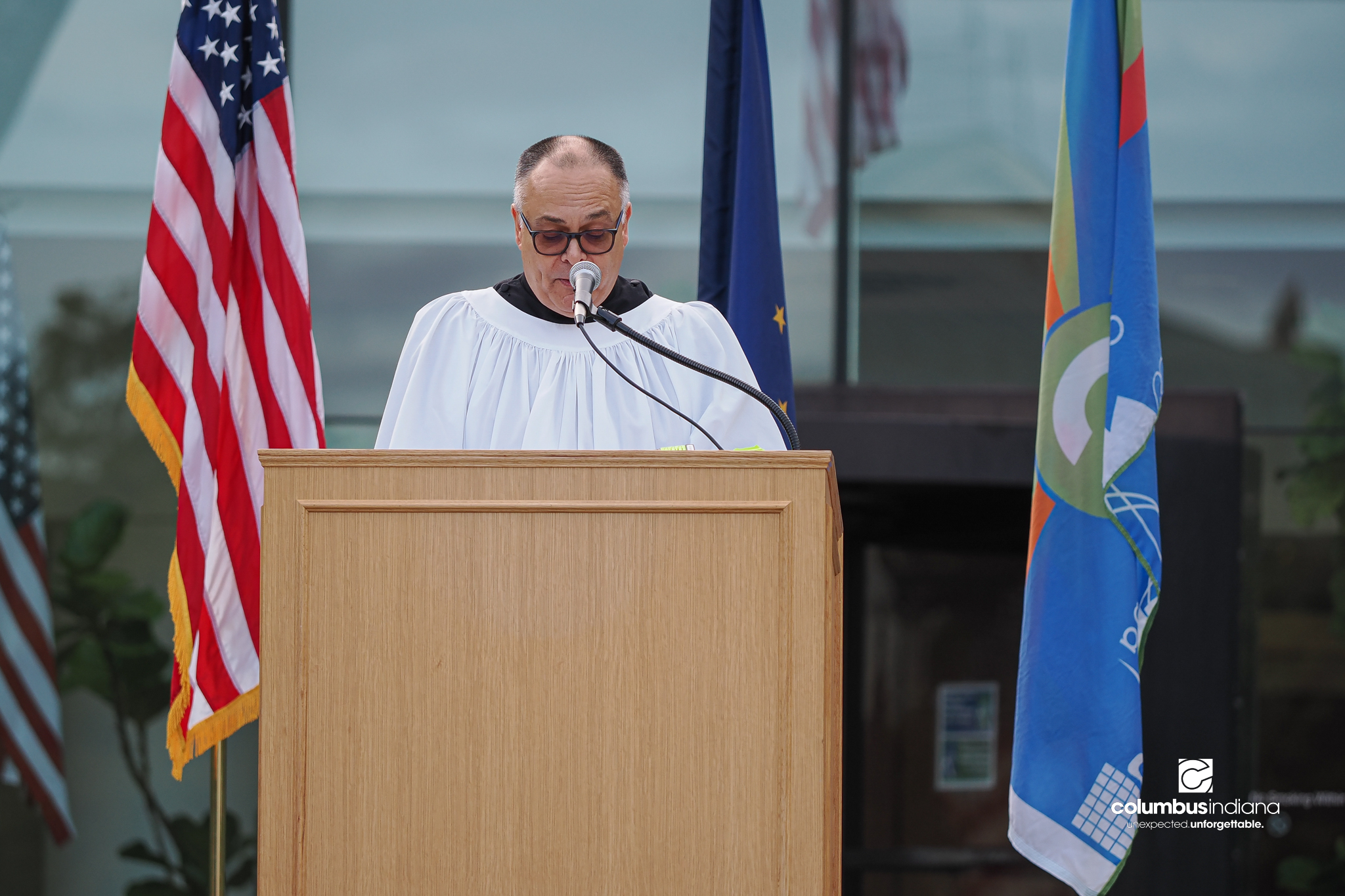 Columbus Fire Chaplain Alered Dean delivers the invocation during aceremony to commemorate the 25th anniversary of Sept. 11, at Columbus City Hall in Columbus, Ind., Friday, Sept. 11, 2026.