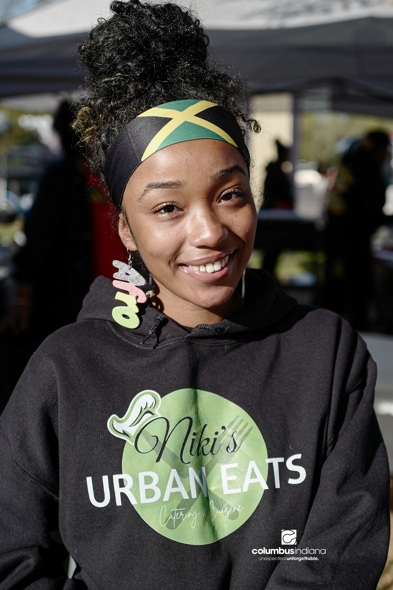 Various images of the sights of Ethnic Expo in Columbus, Indiana. The photos show food, people of different ethnicities and performances as well tents and other spaces vendors are using.